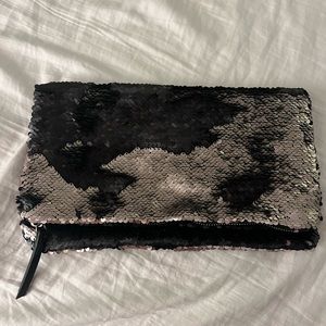 Never used black sequins clutch